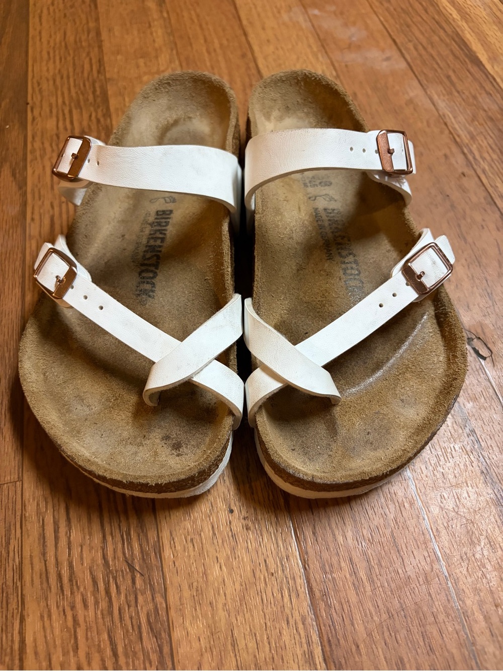 Birkenstock White Two-Strap Sandals with Rose Gold Buckles
